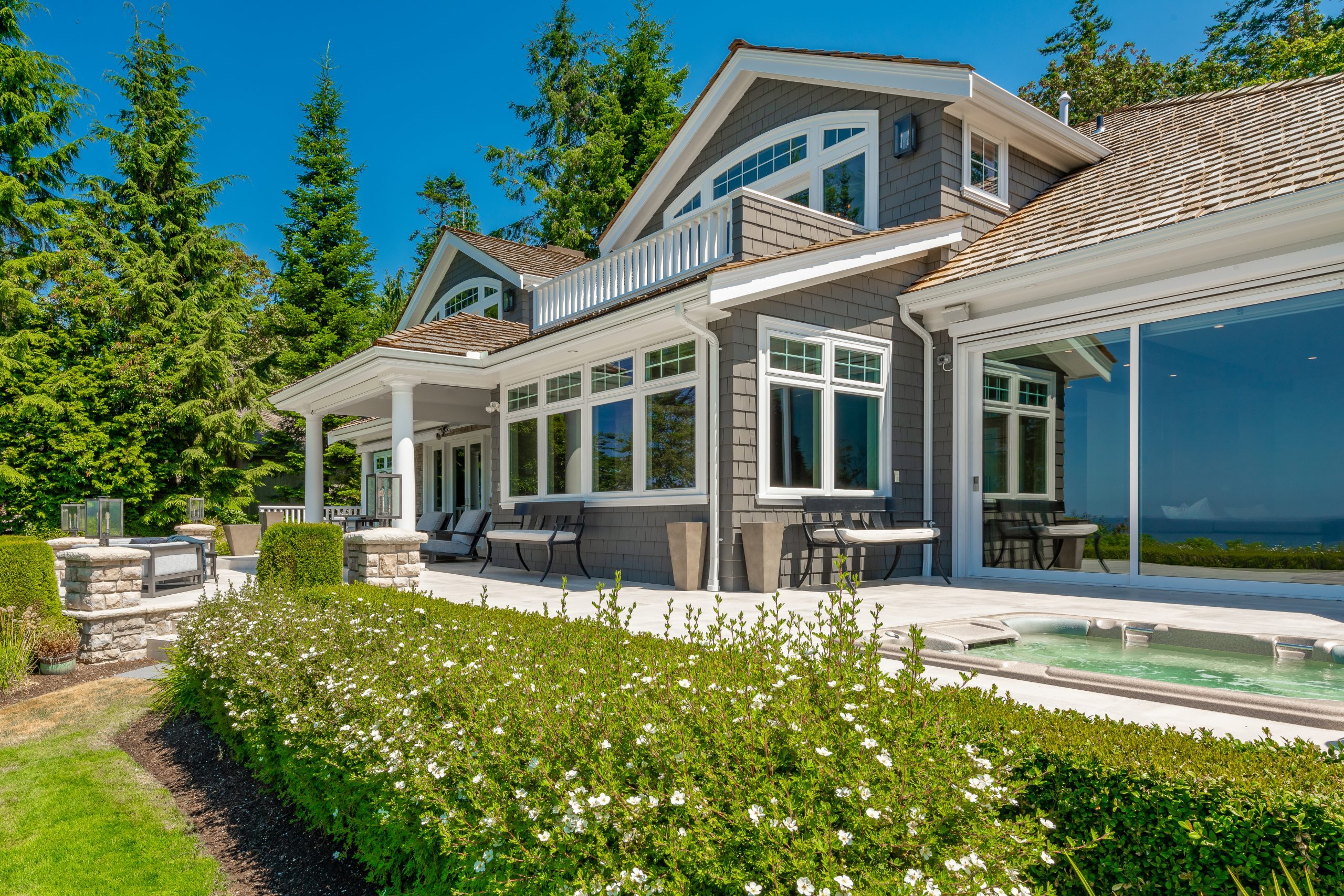 Beautifully remodelled residential home in pacific northwest waterfront ocean view with expansive deck back yard and elegant foyer with stair case