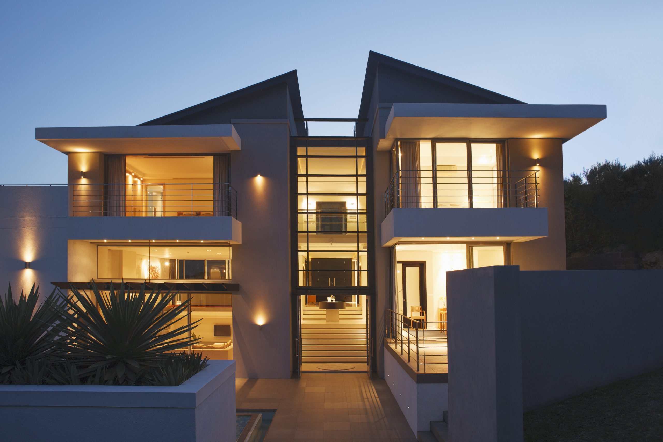 Modern house illuminated at night