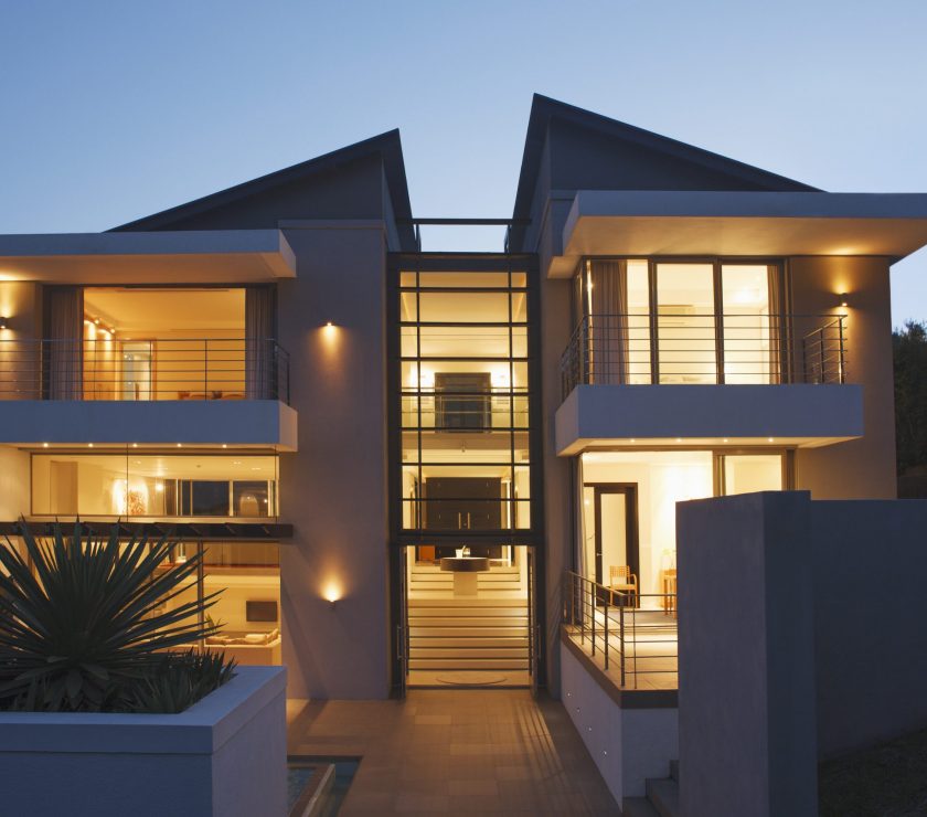 Modern house illuminated at night