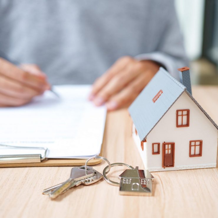 Real Estate Contract Signing For Property Purchase Mortgage Documentation And Ownership Transfer.