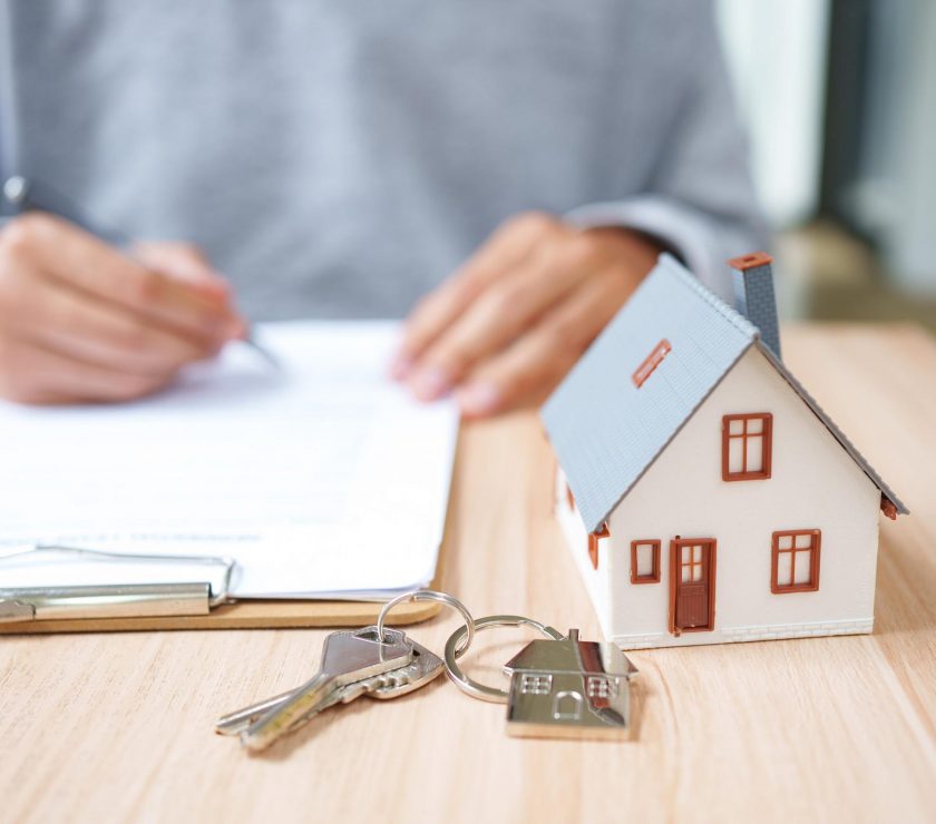 Real Estate Contract Signing For Property Purchase Mortgage Documentation And Ownership Transfer.