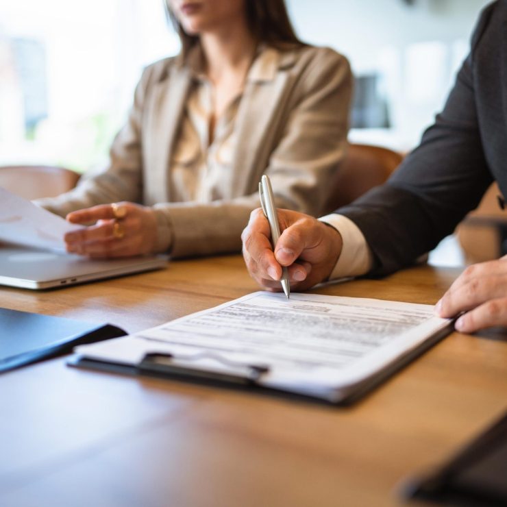 Close up on businessman sign business document or contract