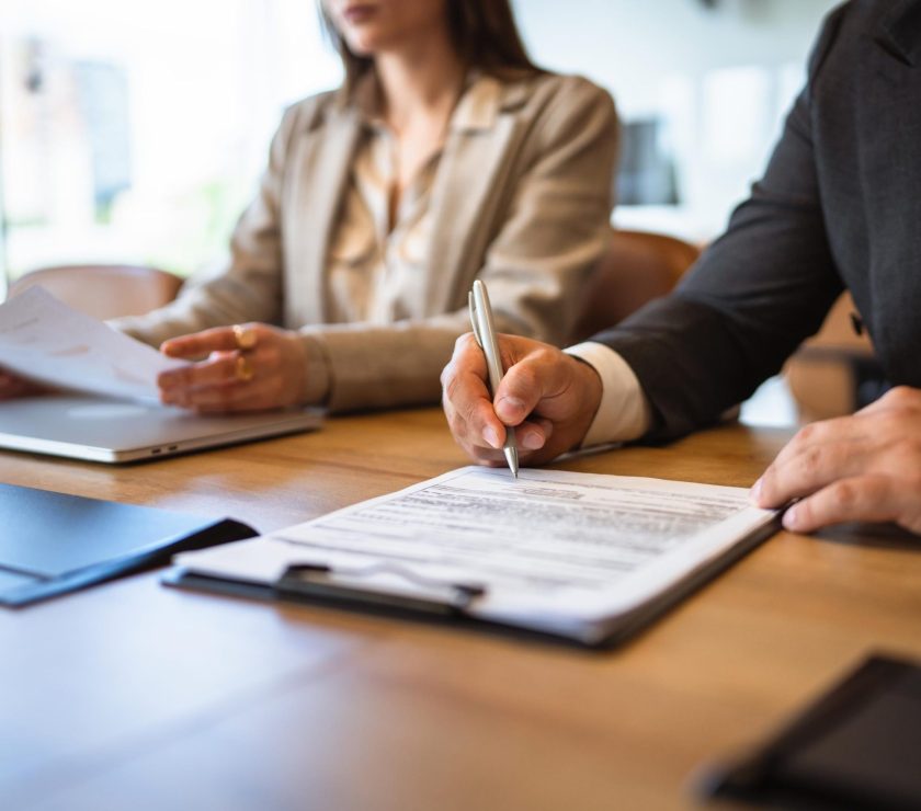 Close up on businessman sign business document or contract