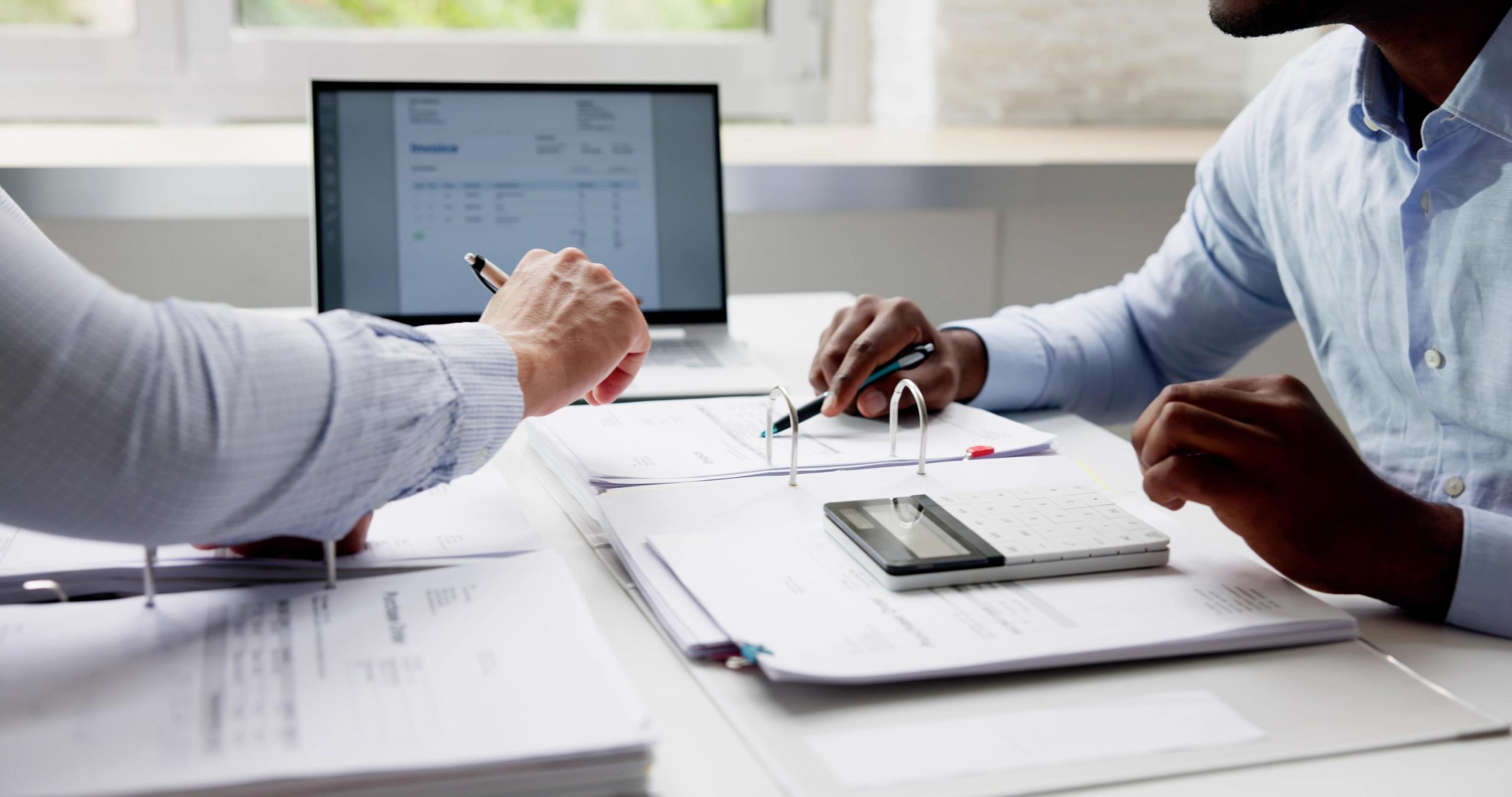 Tax Compliance And Invoice Accounting Using Calculator