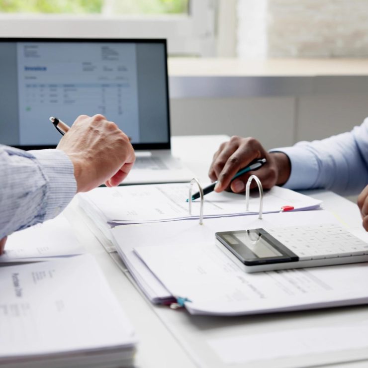 Tax Compliance And Invoice Accounting Using Calculator
