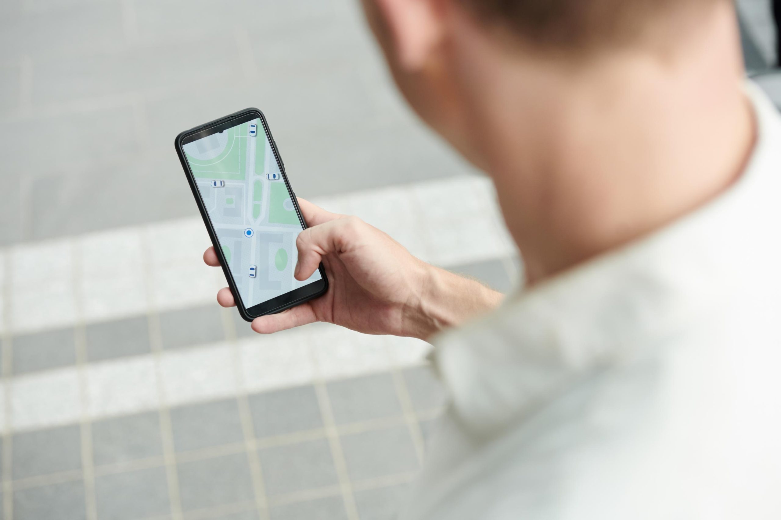 Man Tracking Taxi Car