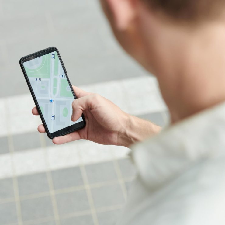 Man Tracking Taxi Car